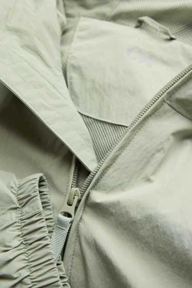 Uomo - Giacca impermeabile con cappuccio - idrorepellente - verde chiaro