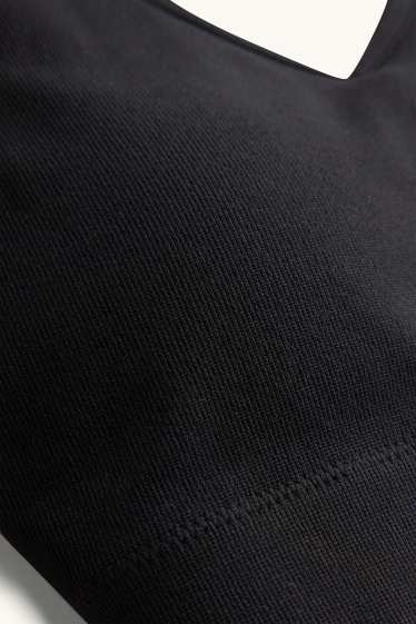 Dames - Sport-BH - voorgevormd - ribstof - seamless - zwart