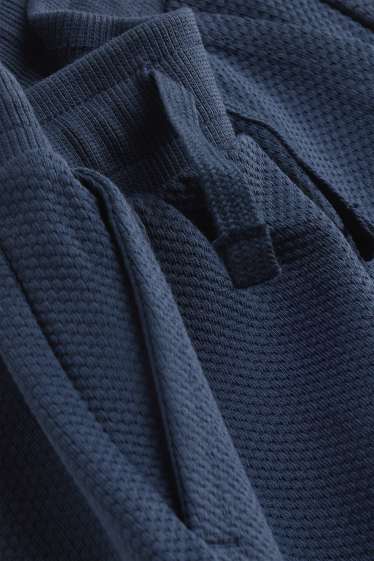 Kinderen: jongens - Joggingbroek - met structuur - donkerblauw