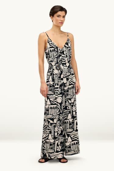 Damen - Jumpsuit mit V-Ausschnitt und Gürtel - gemustert - schwarz / weiss