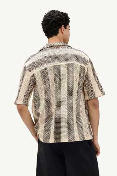 Hommes - Chemise - relaxed fit - col à revers - à rayures - finition texturée - noir / beige