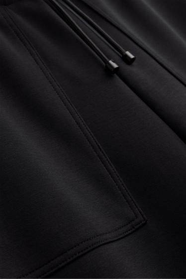 Dona - Pantalons de xandall - negre