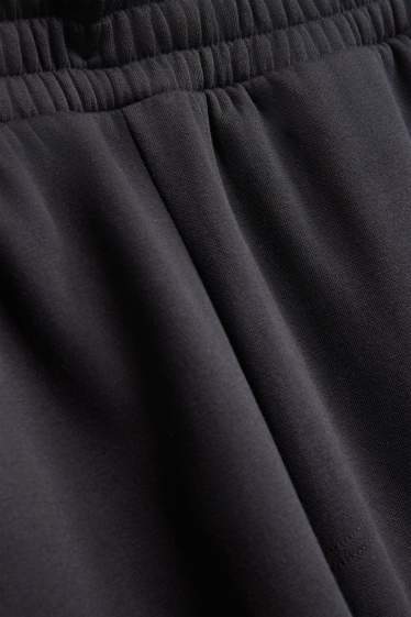 Bărbați - Pantaloni de trening - negru