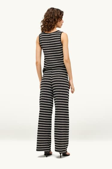 Dona - Pantalons de punt - high waist - regular fit - estampats - negre/blanc