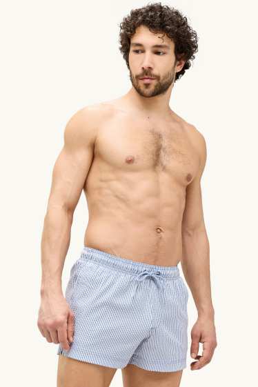 Hommes - Short de bain - finition texturée - bleu / blanc