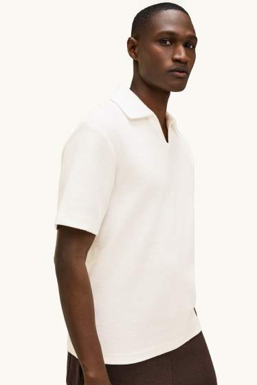 Heren - Gebreid poloshirt - relaxed fit - wit