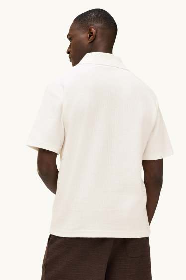 Heren - Gebreid poloshirt - relaxed fit - wit
