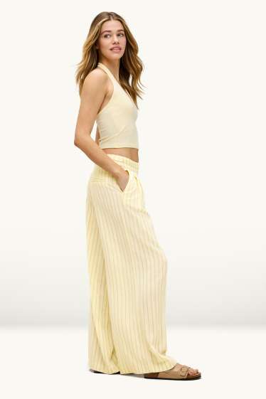 Dona - Pantalons de tela amb component de lli - mid waist - wide leg - groc