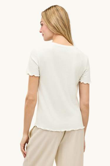 Femmes - T-shirt en finition pointelle - regular fit - blanc