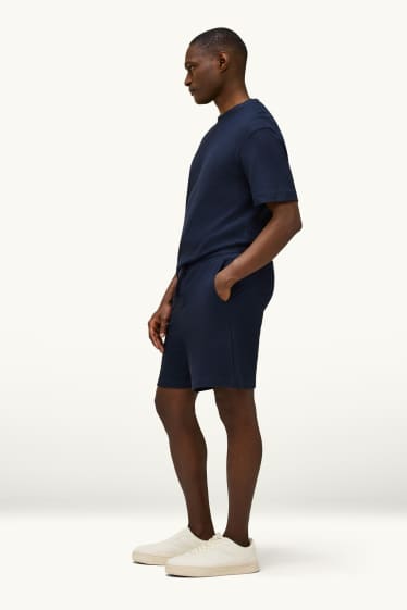Home - Pantalons curts de xandall - texturats - blau fosc