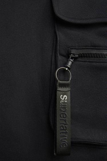 Uomo - Pantaloni sportivi cargo - nero