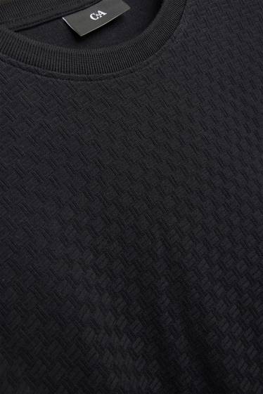 Uomo - T-shirt - regular fit - tessuto tramato - nero
