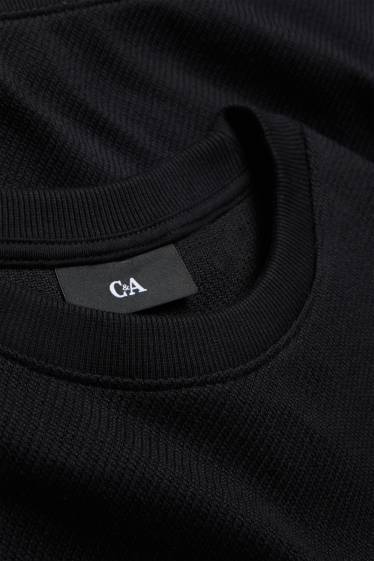 Hommes - Sweat - finition texturée - noir