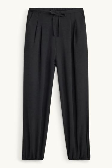 Women - Harem trousers - mid-rise waist - balloon leg - black