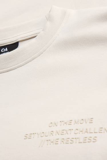 Heren - Sportshirt - relaxed fit - crèmekleurig