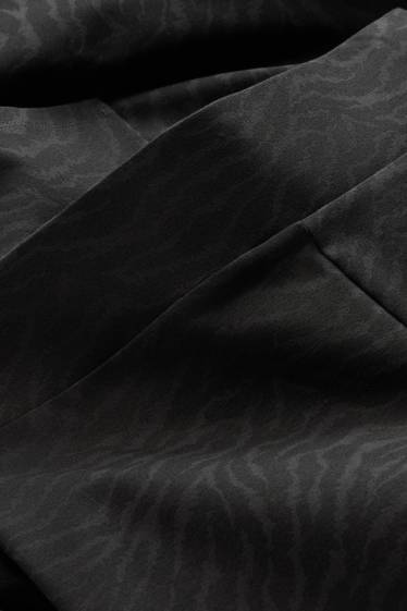 Dona - Leggings straight - estampat - negre