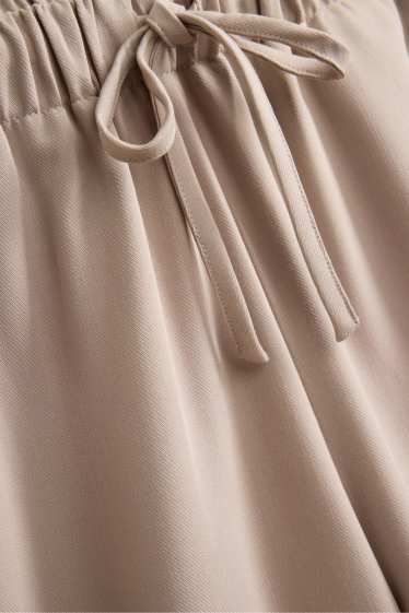 Femei - Pantaloni office - talie medie - wide leg - bej