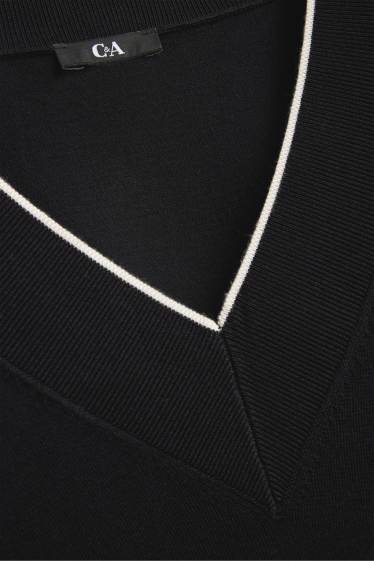 Damen - Pullover mit V-Ausschnitt - schwarz / weiß