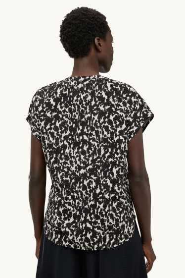 Damen - Bluse mit V-Ausschnitt - gemustert - schwarz