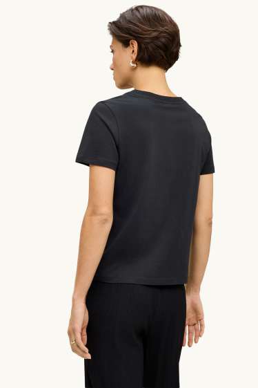 Femmes - T-shirt - regular fit - effet brillant - noir
