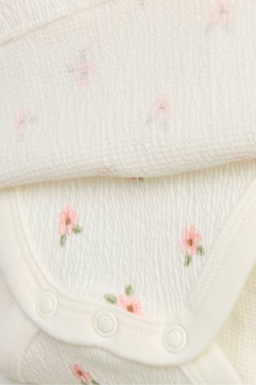 Nadó nena - Floretes - vestit per a nadó - blanc