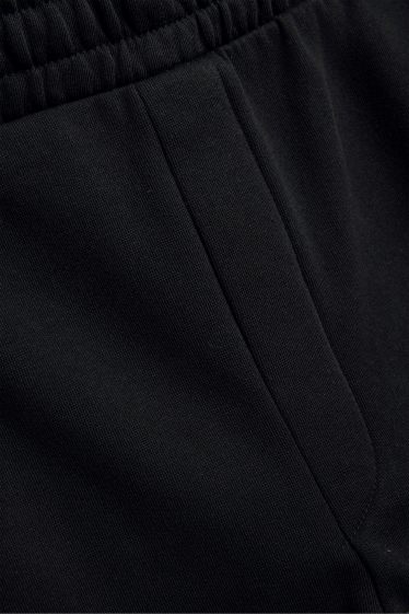 Uomo - Pantaloni sportivi - nero