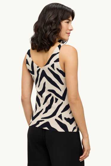 Dames - Gebreide top met V-hals - met patroon - zwart / beige