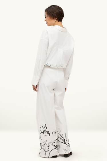 Women - Cloth trousers - high waist - wide leg - white