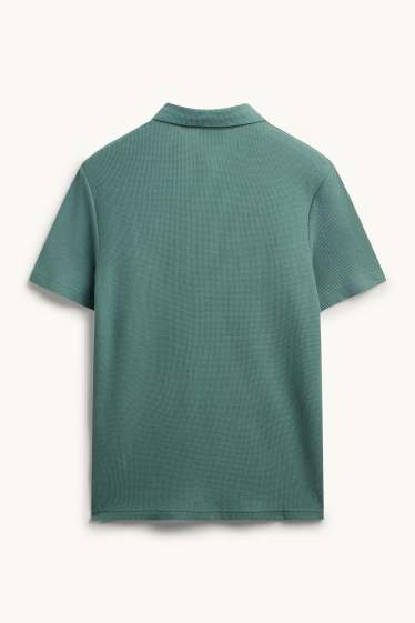 Hommes - Polo - regular fit - finition texturée - bleu pétrole