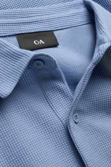 Heren - Poloshirt - regular fit - met structuur - lichtblauw