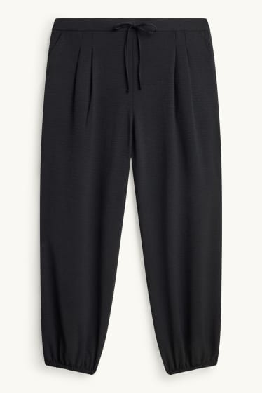 Women - Harem trousers - mid-rise waist - balloon leg - black