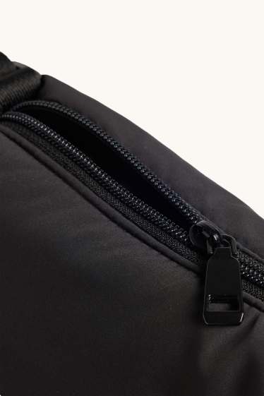 Femmes - Sac à bandoulière matelassé - noir