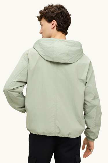 Uomo - Giacca impermeabile con cappuccio - idrorepellente - verde chiaro