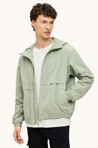 Uomo - Giacca impermeabile con cappuccio - idrorepellente - verde chiaro