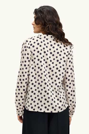 Dames - Blouse met V-hals - met stippen - wit / zwart