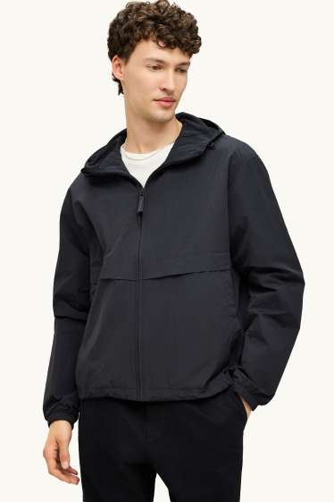 Uomo - Giacca impermeabile con cappuccio - idrorepellente - nero