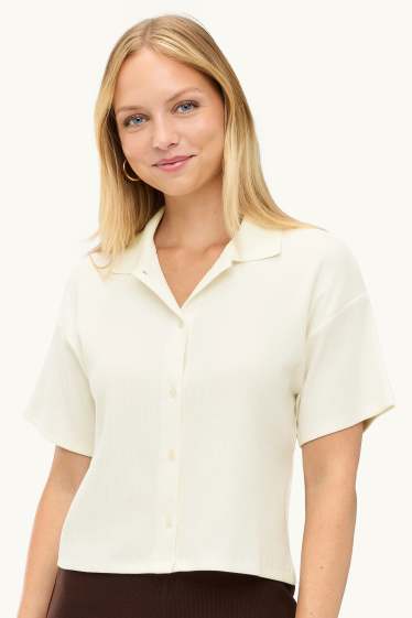Dona - Polo - slim fit - acanalat - blanc trencat