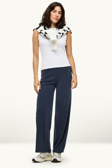 Dona - Pantalons de tela - mid waist - palazzo - blau fosc