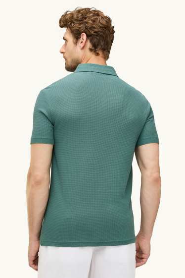 Hommes - Polo - regular fit - finition texturée - bleu pétrole