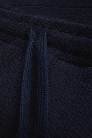 Men - Sweat shorts - textured - dark blue