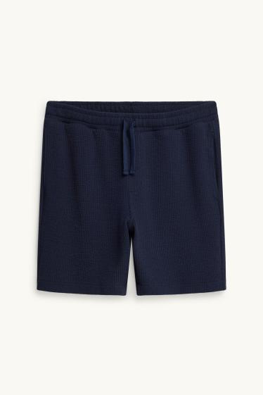 Men - Sweat shorts - textured - dark blue