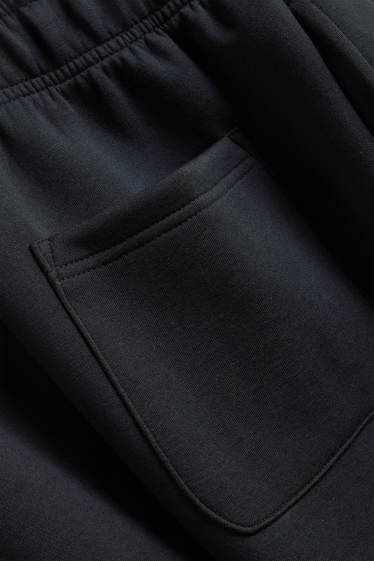 Hommes - Pantalon de jogging - noir