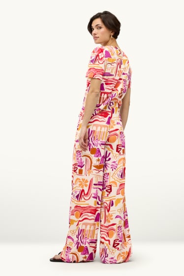 Dames - Pantalon - mid waist - palazzo - met patroon - oranje