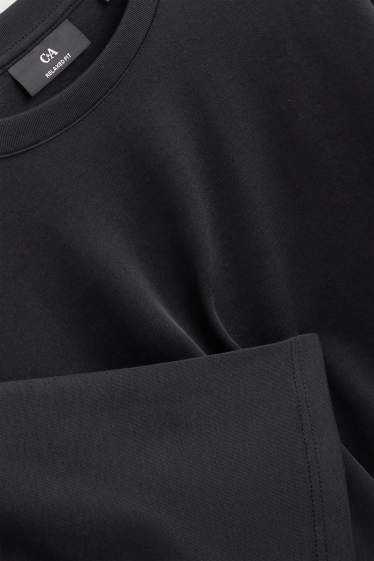 Heren - T-shirt - relaxed fit - zwart