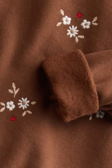 Baby: meisjes - Bloemetje - babysweatshirt - bruin