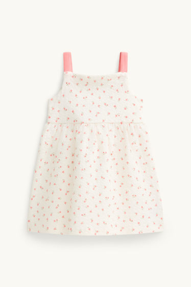 Baby: meisjes - Bloemetje - babyjurk - met structuur - wit