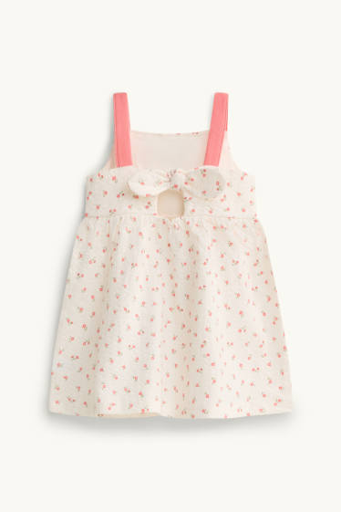 Baby: meisjes - Bloemetje - babyjurk - met structuur - wit
