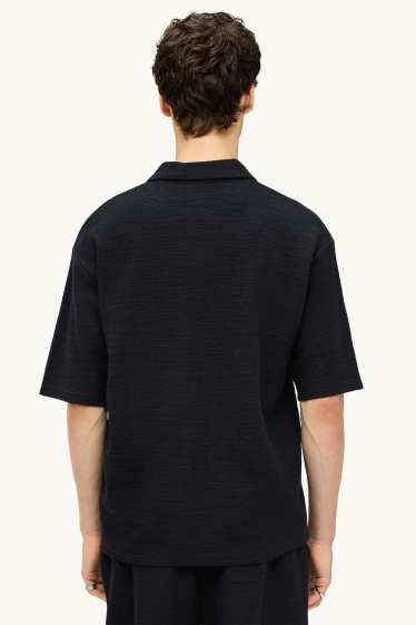 Uomo - Polo in maglia - relaxed fit - nero
