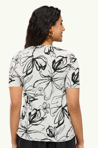 Femmes - T-shirt - regular fit - à fleurs - blanc / noir