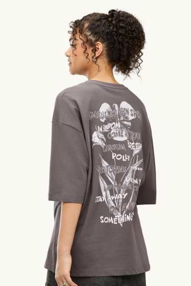 Dames - T-shirt - oversized - Nirvana - bruin